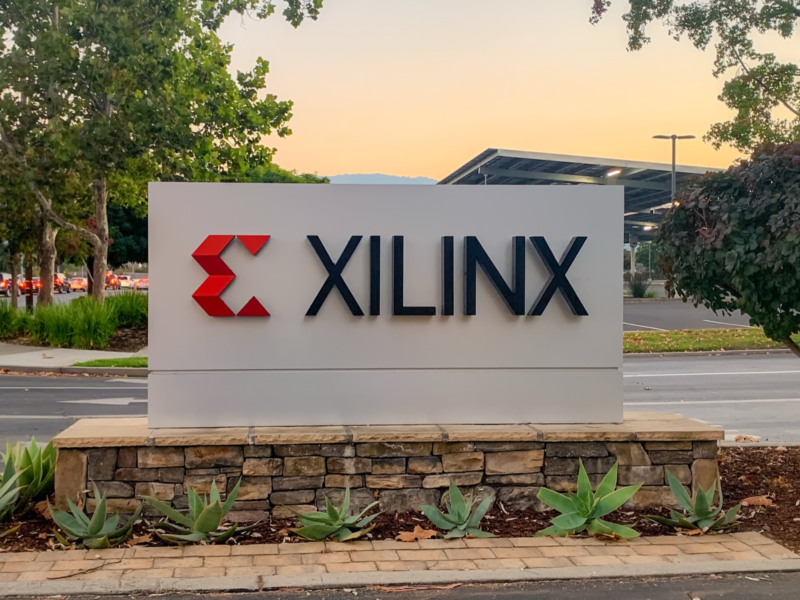 The entrance sign at Xilinx's headquarters on Logic Drive, San Jose, California, at sunset