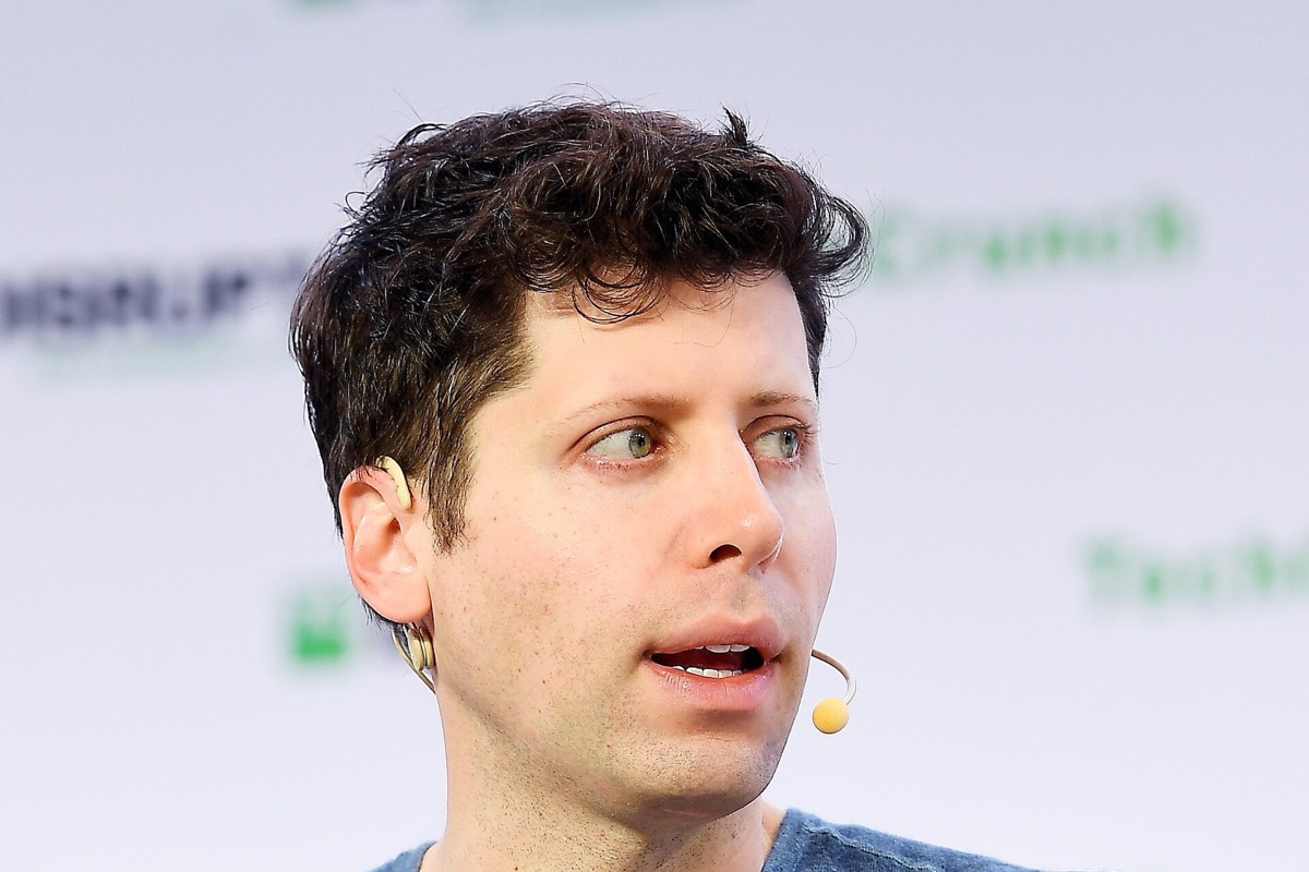 Sam Altman speaking on stage at TechCrunch Disrupt San Francisco in 2019