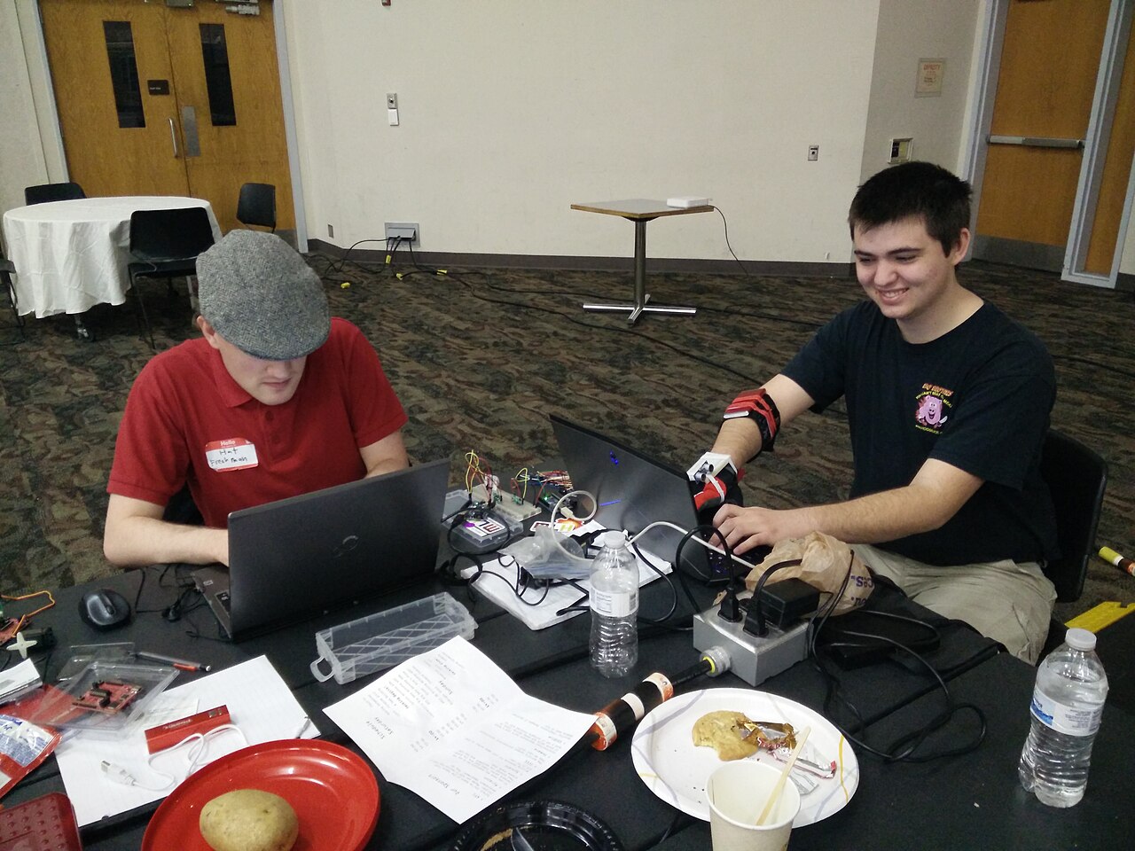 Students working on laptops at a Major League Hacking hackathon